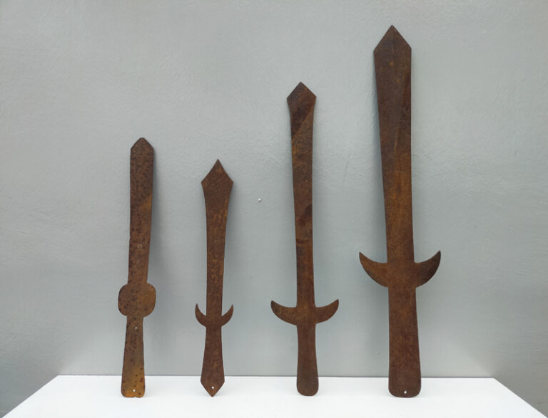 FOUR VOTIVE SWORDS