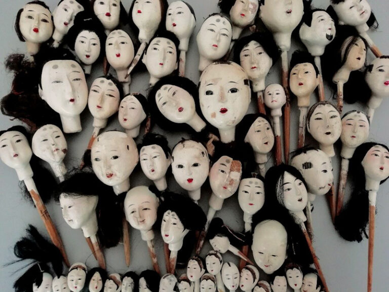 60 PIECES OF HINA DOLL HEADS