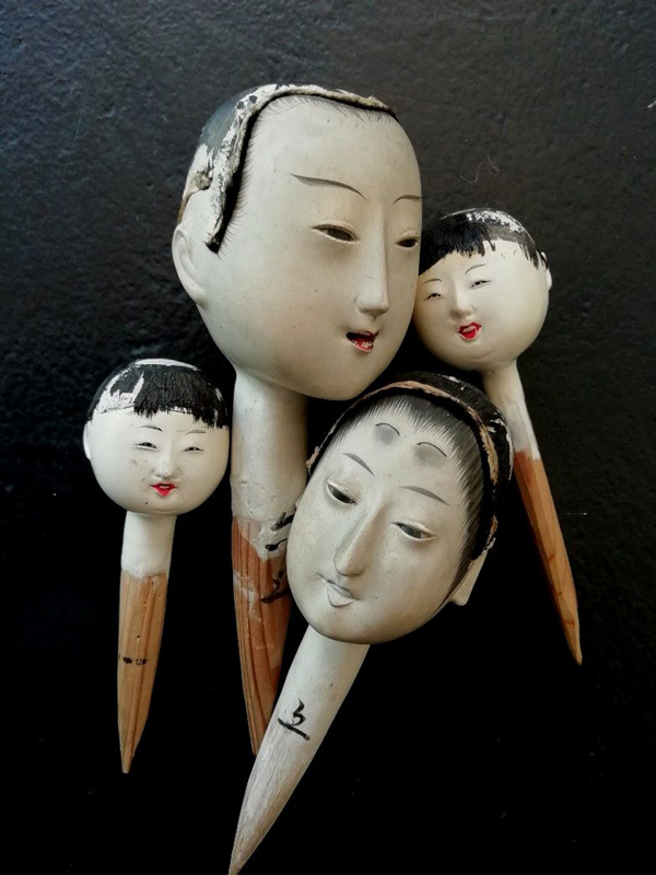 FAMILIAL FOUR JAPANESE DOLL HEADS