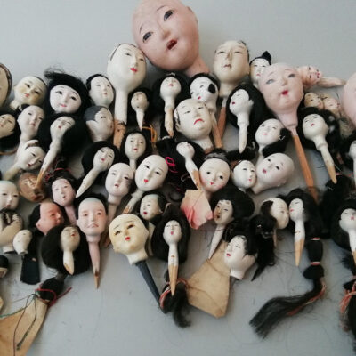 54 PIECES OF JAPANESE DOLL HEADS