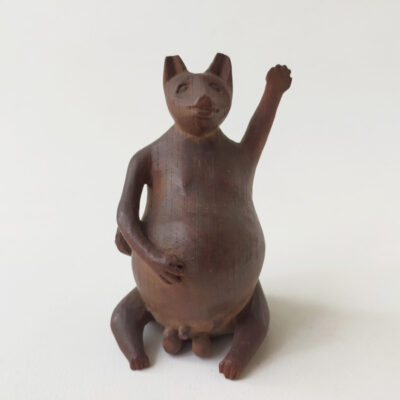 BECKONING RACOON DOG