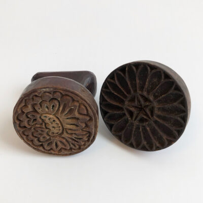 TWO RICE CAKE MOLDS WITH FLOWER DESIGN