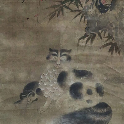 TWO CATS UNDER A TREE
