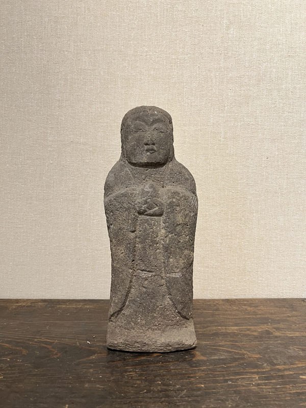 STONE BOSATSU STATUE WITH HOJU SACRED GEM